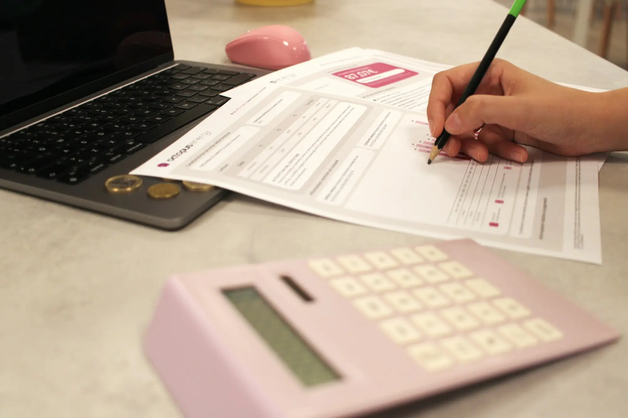 Working through a budget with a calculator
